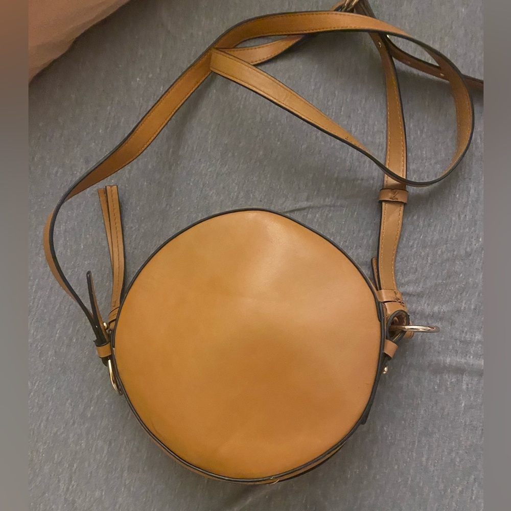 Tan circle cross body purse